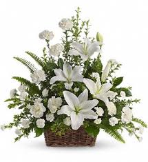 White Lilies in a basket