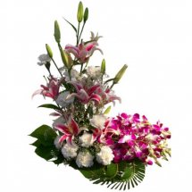 Basket of 4 pink lili 4 purple orchids and 10 white carnations