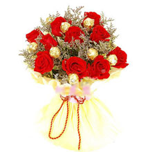 10 red roses and 6 Ferrero in the same bouquet