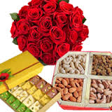 12 red roses 1/2 Kg dryfruits 1/2 Kg Mix Sweets
