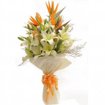White Lilies and Bird of paradise bouquet with White wrapping