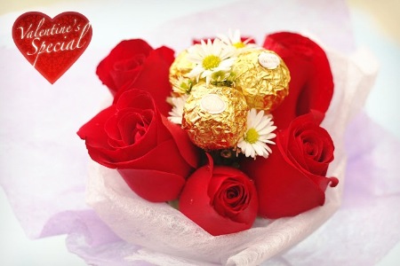 6 red roses with 3 Ferrero rocher in a bouquet