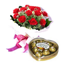 A dozen red roses bouquet with small box of heart chocolates