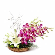 Basket of 3 White lilies and 6 purple orchids