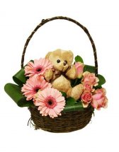 Teddy sitting in Basket of Mix Flowers