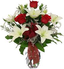 Red roses and white Lilies in vase